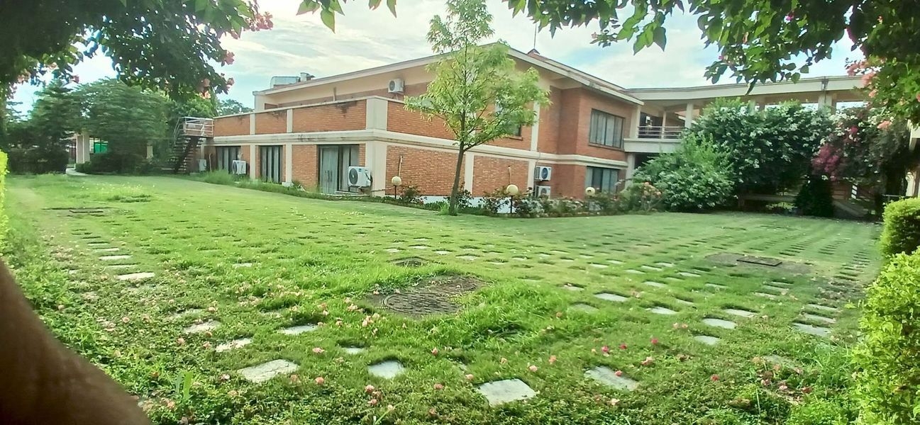 Landscaped garden pathway at Hotel Kasai